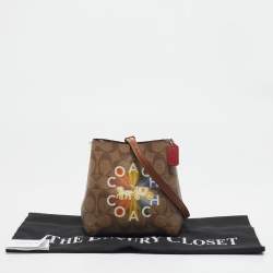 Pre Owned Coach Beige Signature Coated Canvas and Leather Mini Radial Rainbow Town Bucket Bag