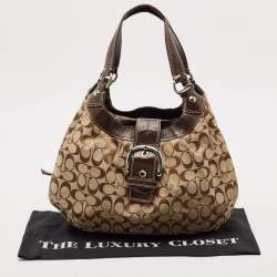 Pre Owned Coach Beige/Brown Signature Canvas and Leather Soho Lynn Hobo