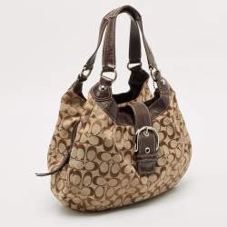 Pre Owned Coach Beige/Brown Signature Canvas and Leather Soho Lynn Hobo
