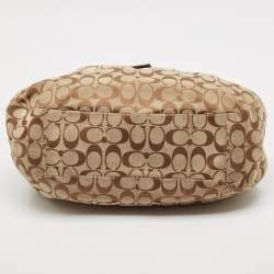 Pre Owned Coach Beige/Brown Signature Canvas and Leather Soho Lynn Hobo