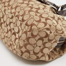Pre Owned Coach Beige/Brown Signature Canvas and Leather Soho Lynn Hobo