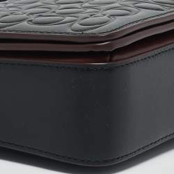 Pre Owned Coach Black Signature Embossed Leather Dinky Crossbody Bag