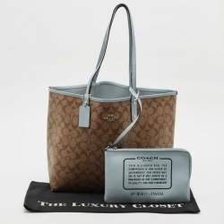 Pre Owned Coach Brown/Light Blue Signature Coated Canvas Reversible City Tote