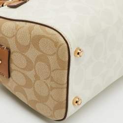 Pre Owned Coach Off White/Brown Signature Coated Canvas and Leather Rowan Boston Bag