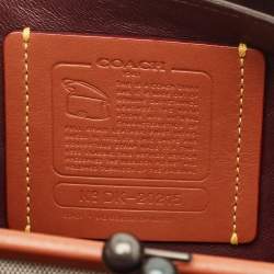 مملوكة مسبقًا حقيبة كتف كوتش دينكي 24 جلد رمادي متدرج مسامير غربية