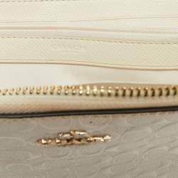 Pre Owned Coach White Signature Embossed Leather Long Zip Around Wallet
