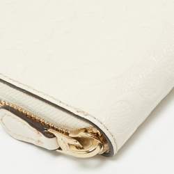 Pre Owned Coach White Signature Embossed Leather Long Zip Around Wallet