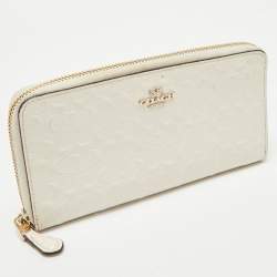 Pre Owned Coach White Signature Embossed Leather Long Zip Around Wallet