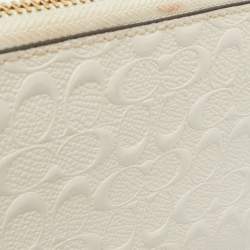 Pre Owned Coach White Signature Embossed Leather Long Zip Around Wallet