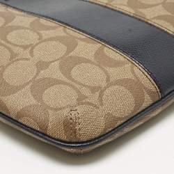 Pre Owned حقيبة كروس كوتش قماش مشمع بتوقيع العلامة التجارية بيج/أزرق وجلد كت