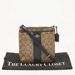 Pre Owned حقيبة كروس كوتش قماش مشمع بتوقيع العلامة التجارية بيج/أزرق وجلد كت