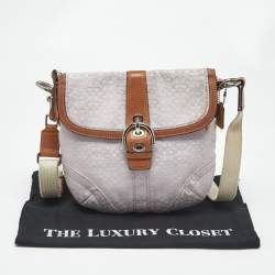 Pre Owned Coach Lavender Logo Jacquard Canvas Soho Swing Crossbody Bag