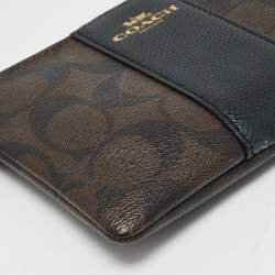Pre Owned Coach Brown/Black Signature Coated Canvas and Leather Corner Zip Wristlet
