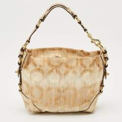 Pre Owned حقيبة كارلي هوبو كوتش كانفاس شهيرة وجلد ذهبي