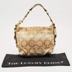 Pre Owned حقيبة كارلي هوبو كوتش كانفاس شهيرة وجلد ذهبي