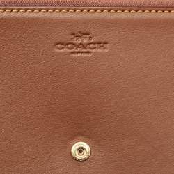 مملوكة مسبقًا حقيبة كروس بودي بطبعة زهور من كانفاس مطلي بنقشة محددة بني من كوتش