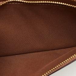 مملوكة مسبقًا حقيبة كروس بودي بطبعة زهور من كانفاس مطلي بنقشة محددة بني من كوتش