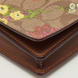 مملوكة مسبقًا حقيبة كروس بودي بطبعة زهور من كانف اس مطلي بنقشة محددة بني من كوتش
