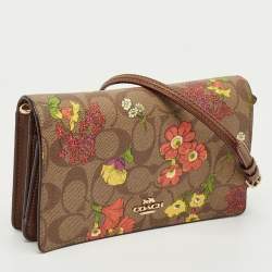 مملوكة مسبقًا حقيبة كروس بودي بطبعة زهور من كانفاس مطلي بنقشة محددة بني من كوتش