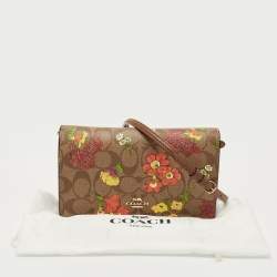 مملوكة مسبقًا حقيبة كروس بودي بطبعة زهور من كانفاس مطلي بنقشة محددة بني من كوتش