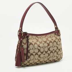 Pre Owned Coach Burgundy/Beige Signature Canvas Tassel Shoulder Bag