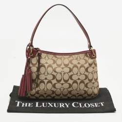 Pre Owned Coach Burgundy/Beige Signature Canvas Tassel Shoulder Bag