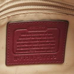 Pre Owned Coach Burgundy/Beige Signature Canvas Tassel Shoulder Bag