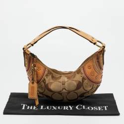 Pre Owned Coach Tan/Beige Signature Canvas and Leather Studded Hobo