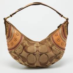 Pre Owned Coach Tan/Beige Signature Canvas and Leather Studded Hobo