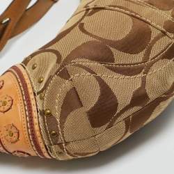 Pre Owned Coach Tan/Beige Signature Canvas and Leather Studded Hobo