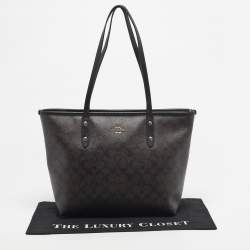 Pre Owned Coach Black/Dark Brown Signature Coated Canvas and Leather City Zip Tote