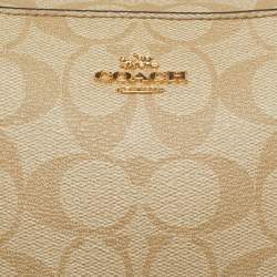 Pre Owned Coach Pink/Beige Signature Coated Canvas and Leather Mini Camera Crossbody Bag