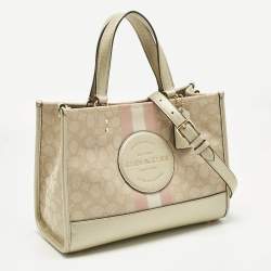 Pre Owned Coach Pale Gold/Beige Signature Jacquard Canvas Dempsey 30 Carryall Tote