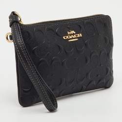 Pre Owned Coach Black Signature Embossed Leather Zip Wristlet