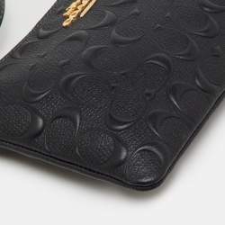Pre Owned Coach Black Signature Embossed Leather Zip Wristlet