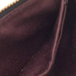 Pre Owned Coach Black Signature Embossed Leather Zip Wristlet