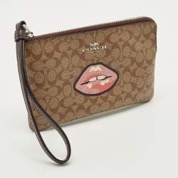 Pre Owned Coach Beige Signature Coated Canvas Lip Corner Wristlet Pouch