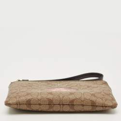 Pre Owned Coach Beige Signature Coated Canvas Lip Corner Wristlet Pouch