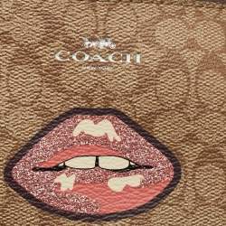 Pre Owned Coach Beige Signature Coated Canvas Lip Corner Wristlet Pouch