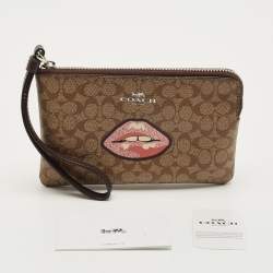 Pre Owned Coach Beige Signature Coated Canvas Lip Corner Wristlet Pouch