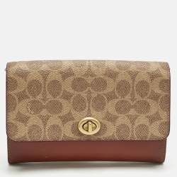 Pre Owned Coach Brown/Beige Signature Coated Canvas and Leather Marlow Clutch Bag