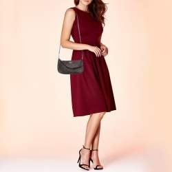 Pre Owned Coach Dark Brown/Black Signature Coated Canvas and Leather Nolita Shoulder Bag
