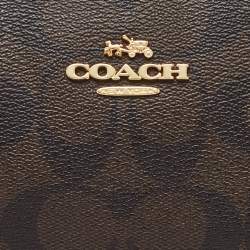 Pre Owned Coach Dark Brown/Black Signature Coated Canvas and Leather Nolita Shoulder Bag