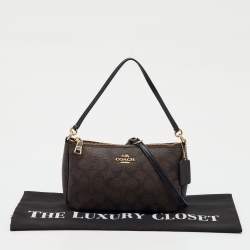 Pre Owned Coach Dark Brown/Black Signature Coated Canvas and Leather Nolita Shoulder Bag