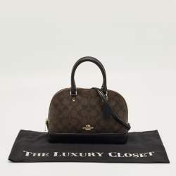 Pre Owned Coach Black/Brown Signature Coated Canvas and Leather Sierra Satchel