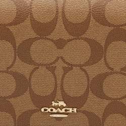 Pre Owned Coach Brown/Beige Signature Coated Canvas and Leather Hayden Foldover Clutch