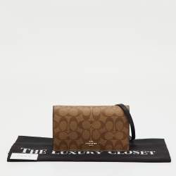 Pre Owned Coach Brown/Beige Signature Coated Canvas and Leather Hayden Foldover Clutch