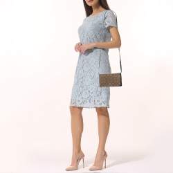 Pre Owned Coach Brown/Beige Signature Coated Canvas and Leather Hayden Foldover Clutch