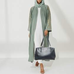 مملوكة مسبقًا حقيبة كوتش كريستي ساتشيل جلد أزرق بحري كبيرة