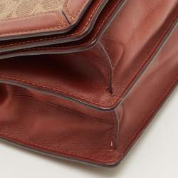 Pre Owned حقيبة كروس بودي كوتش رايلي كانفاس مغلف بالشعار بني